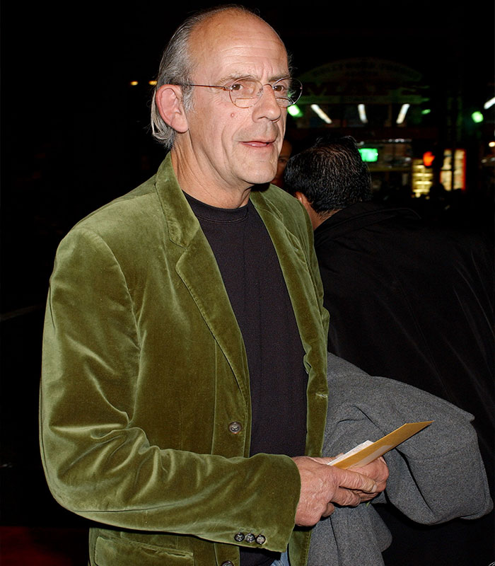 Christopher Lloyd wearing a green velvet jacket at an event. Christopher Lloyd wearing a green velvet jacket at an event.