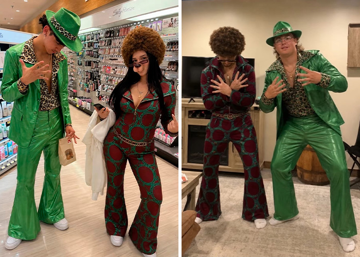 Couple in 70s disco Halloween costumes with afro wigs