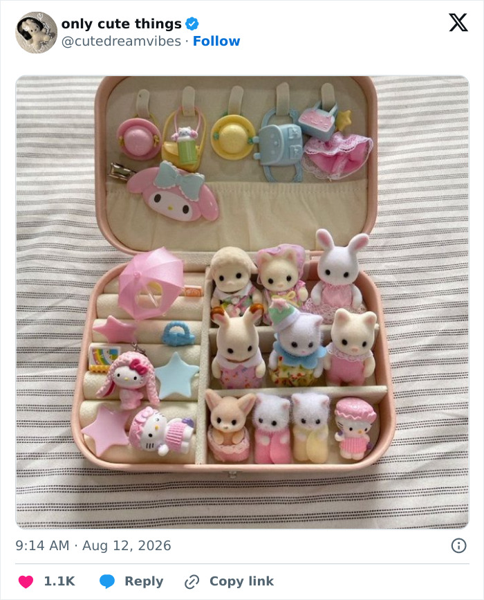 Collection of small animal figurines in a case for adorable little things