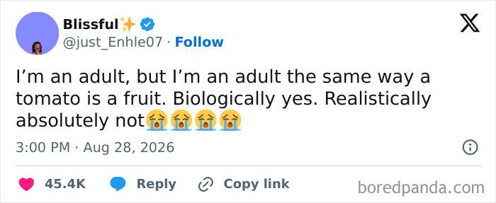 Humorous tweet comparing adulting to a tomato being biologically a fruit but not realistically