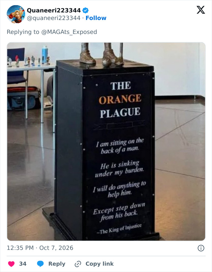 Plaque of the satirical golden statue of Donald Trump with a quote about sitting on the back of a man. Plaque of the satirical golden statue of Donald Trump with a quote about sitting on the back of a man.