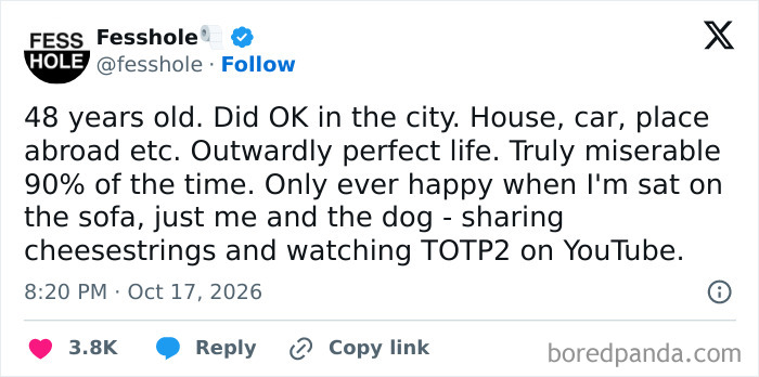 Anonymous confession tweet about being happy only when sitting on the sofa with a dog.