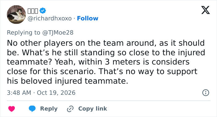 Tweet criticizing football player standing close to injured teammate