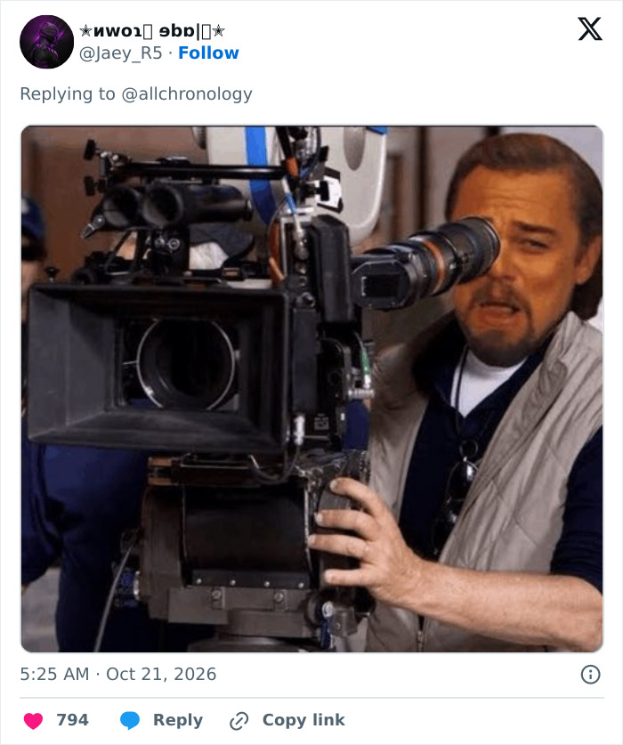 A humorous reaction meme of a cameraman looking through a camera lens. A humorous reaction meme of a cameraman looking through a camera lens.