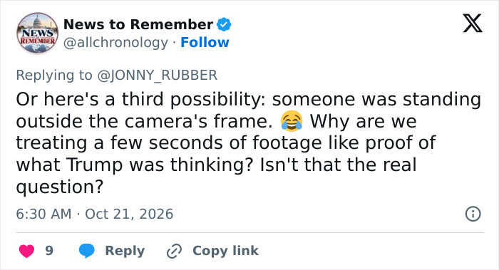 A social media reply discussing camera angles regarding Trump waving at nobody. A social media reply discussing camera angles regarding Trump waving at nobody.