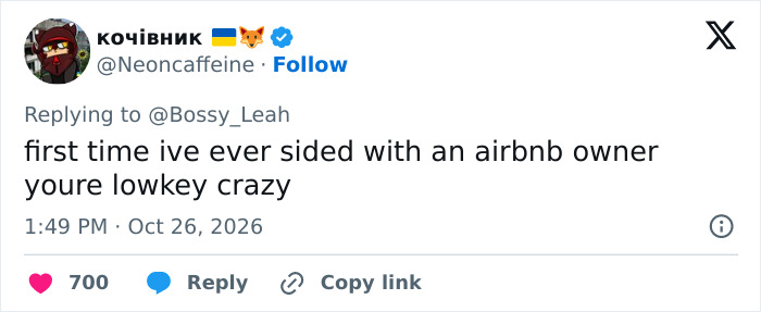 Social media reply from a user supporting an Airbnb host despite finding spiders in a rental property.