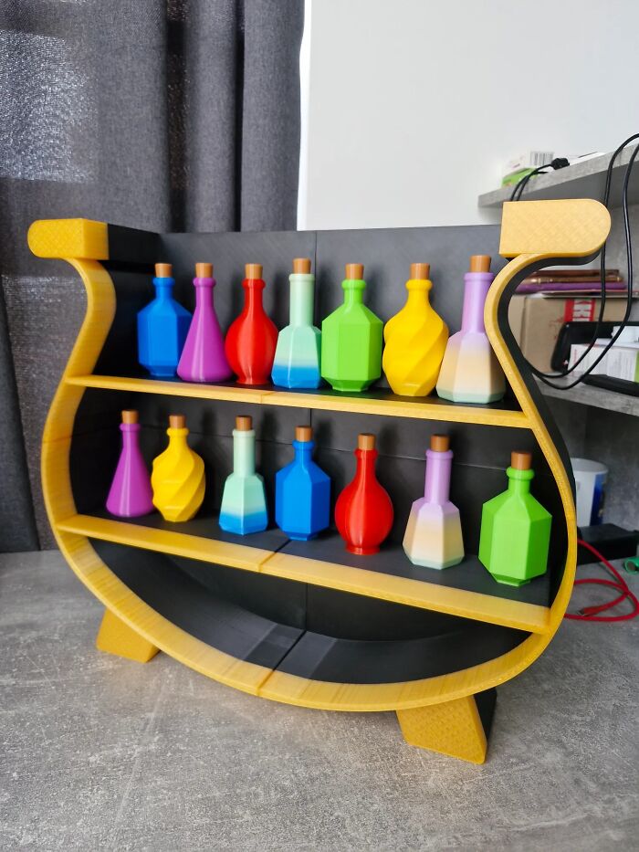 A colorful display of potion bottles made with 3D prints