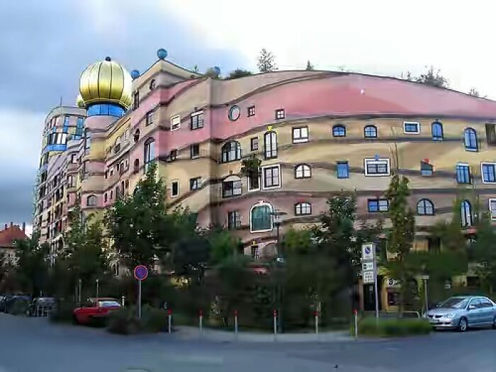 Colorful strange building with rounded lines and unusual architectural design