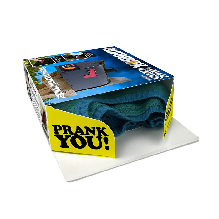 Open prank gift box revealing Prank You text and a real sweater inside Open prank gift box revealing Prank You text and a real sweater inside