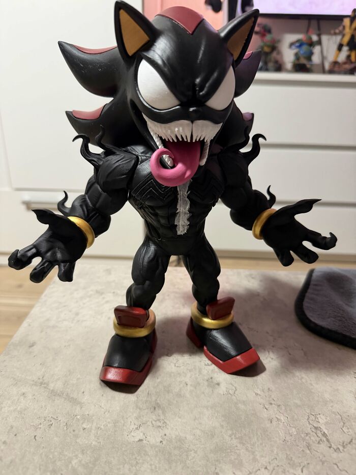 A custom dark figurine combining Sonic and Venom style via 3D prints.