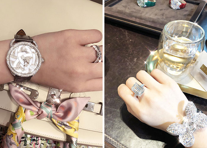 Close-up of luxury diamond rings and a designer watch on hand Close-up of luxury diamond rings and a designer watch on hand