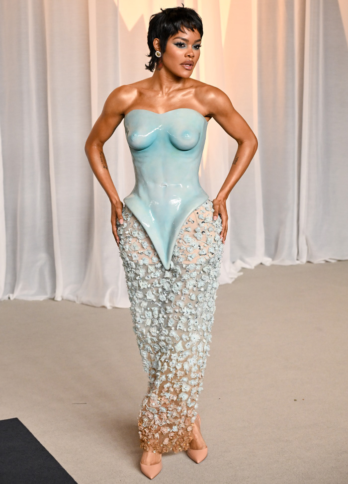 Woman in sculptural blue and floral dress at Academy Museum Gala worst-dressed list