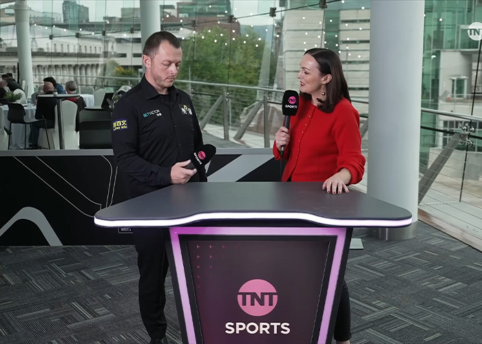 Reporter praised for response during mid-interview with emotional sports star.