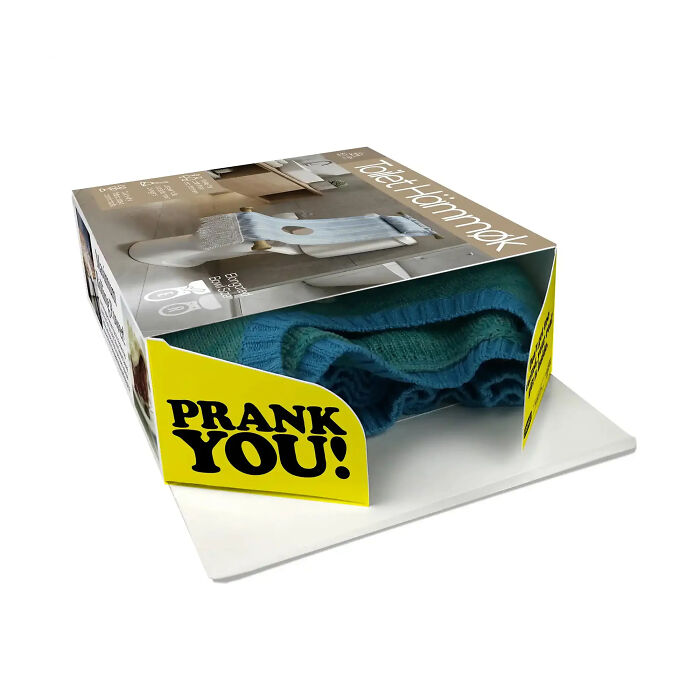 Open view showing a towel inside a hilarious gift box for pranks. Open view showing a towel inside a hilarious gift box for pranks.