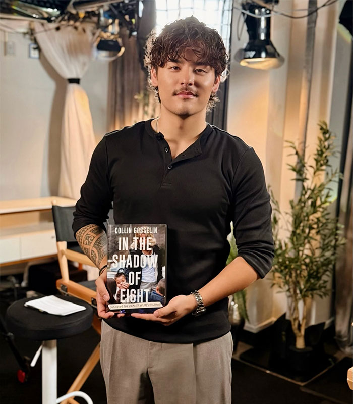 Collin Gosselin holding his book In the Shadow of Eight. Collin Gosselin holding his book In the Shadow of Eight.