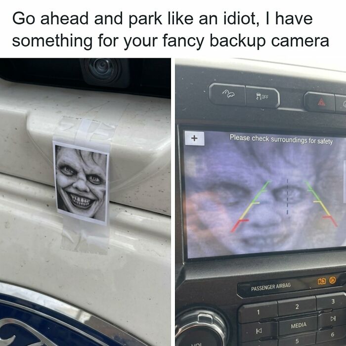 Funny vandalism prank with a scary face sticker taped over a car backup camera