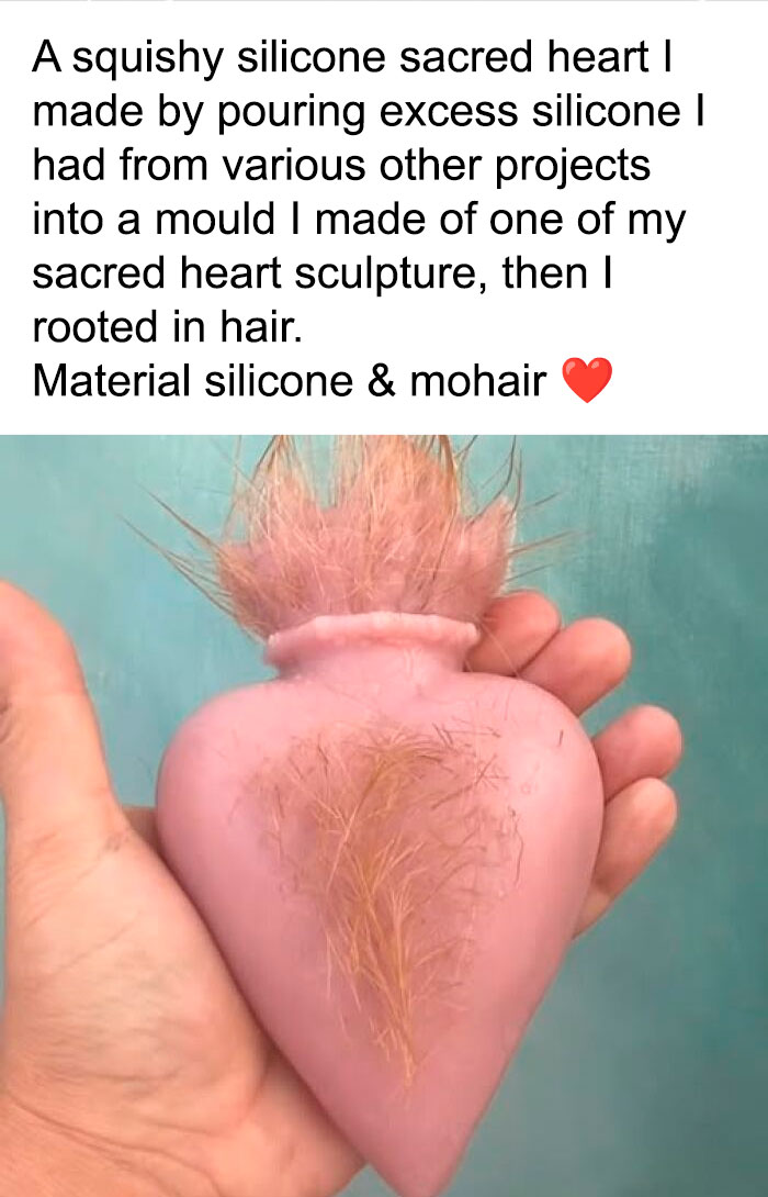 A weird pink silicone sacred heart craft with synthetic hair