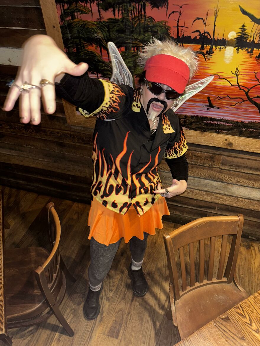 Person dressed as Guy Fieri fairy with wings for creative Halloween costume idea