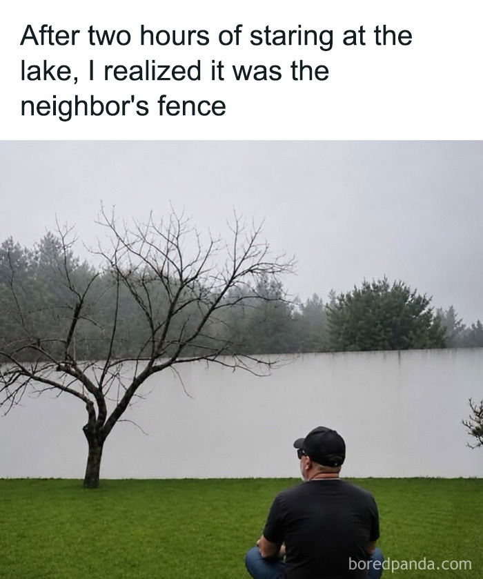 A man sitting on the grass looking at a white fence, an example of edgy memes