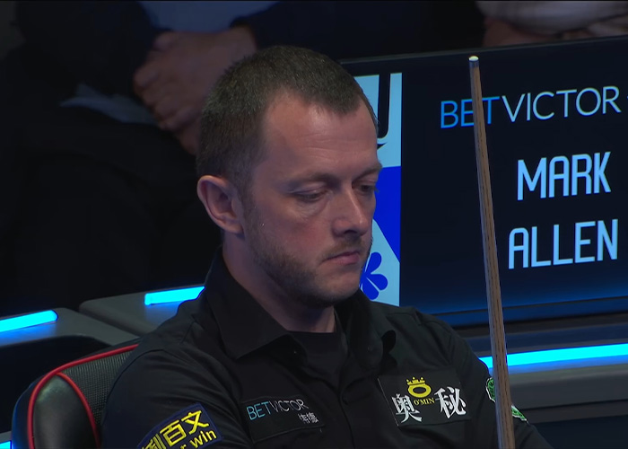 Snooker player Mark Allen looking somber during a sports event after a emotional mid-interview moment.