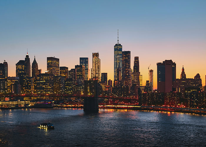 Panoramic skyline view of New York City at dusk relevant to the Amazon exec article.