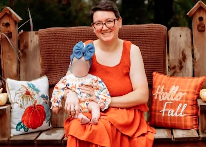 A mother sits with her baby during a autumn themed photo shoot, warning of a life-threatening illness.