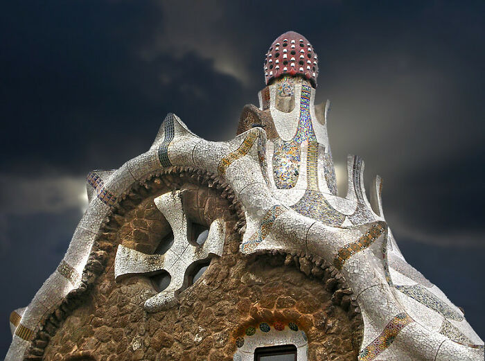 Strange building with mosaic and organic shapes resembling almost alive architecture