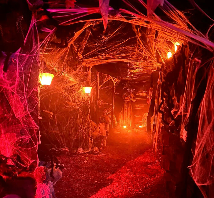 Spooky Halloween haunted house corridor decorated with spider webs Spooky Halloween haunted house corridor decorated with spider webs