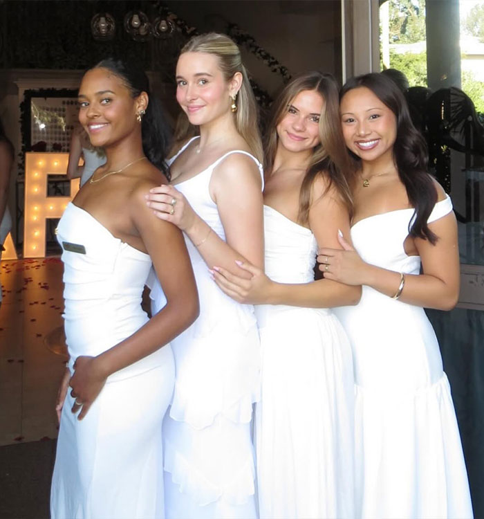 Group of four women in white dresses posing together sorority scandal Group of four women in white dresses posing together sorority scandal