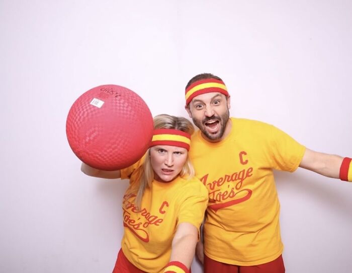 A couple dressed in yellow Average Joes dodgeball uniforms for a low-effort Halloween costume.