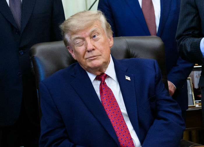 Expert Weighs In After Trump's Odd Stance In Viral Video Leads To Speculation
