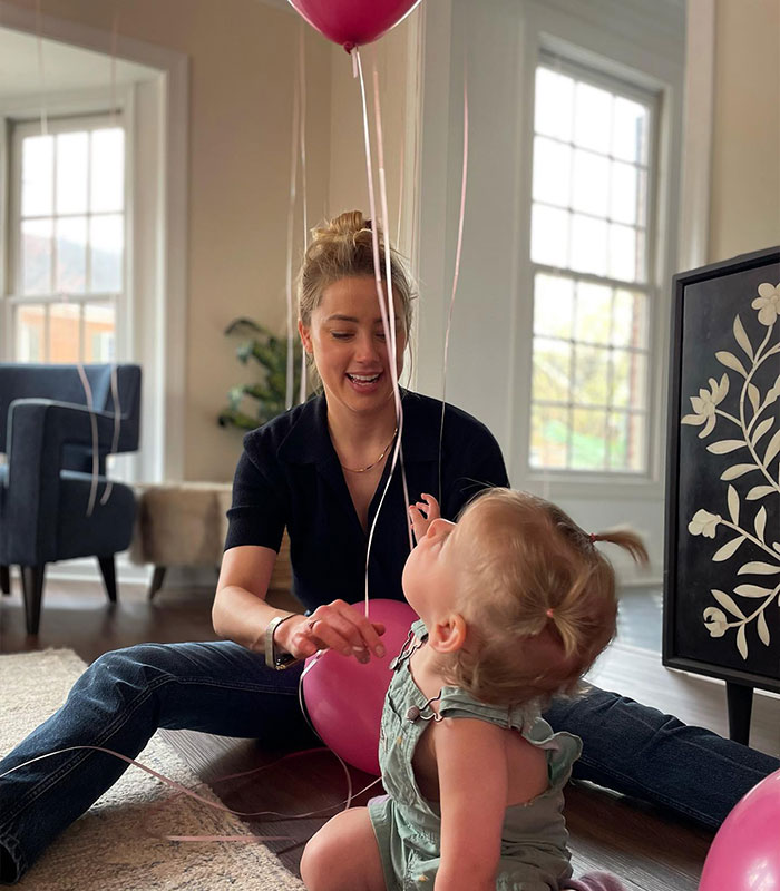Amber Heard's New Spain Photo After Fleeing Hollywood And Changing Her Name Has Fans Zooming In On One Detail Amber Heard's New Spain Photo After Fleeing Hollywood And Changing Her Name Has Fans Zooming In On One Detail