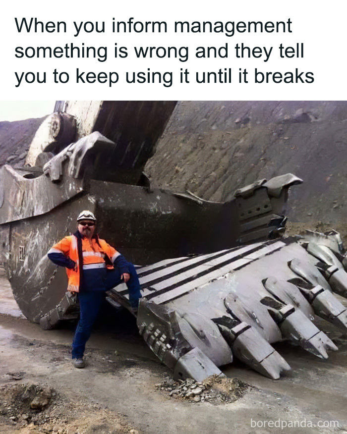 Funny cringe construction fail meme of a worker posing beside a massive excavator bucket