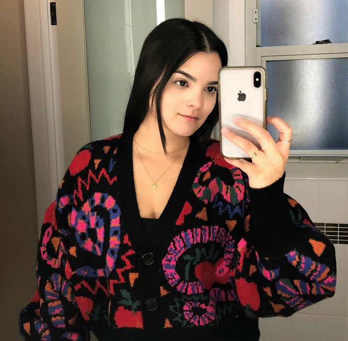 Hollywood star's real-life appearance in a mirror selfie wearing a colorful cardigan Hollywood star's real-life appearance in a mirror selfie wearing a colorful cardigan