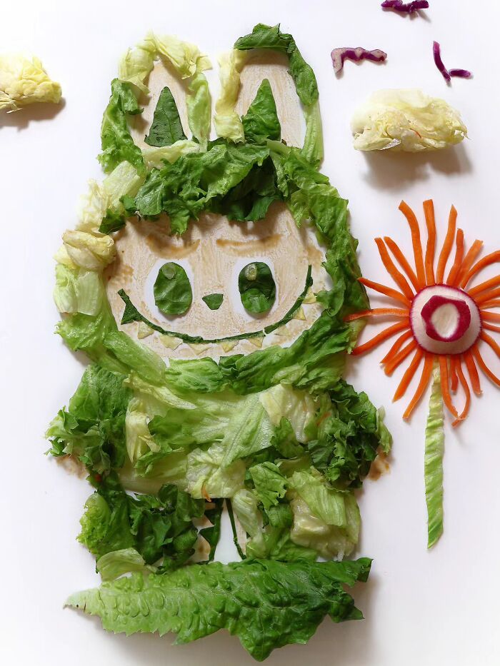 A green cartoon character made of lettuce, representing everyday food as a playful work of art.