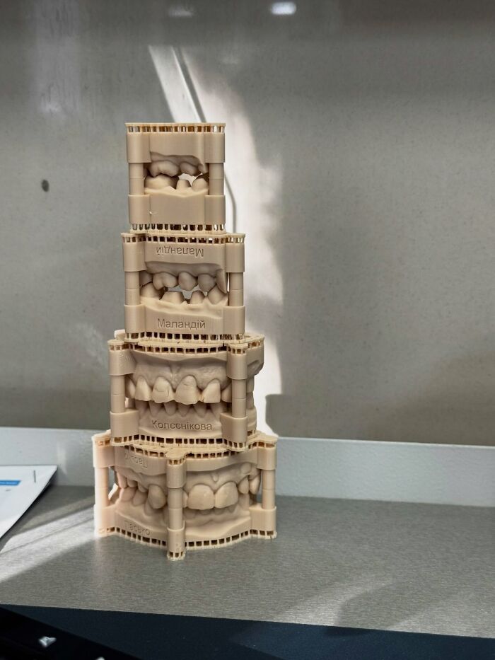 Stacked dental model structures showing dental 3D prints.