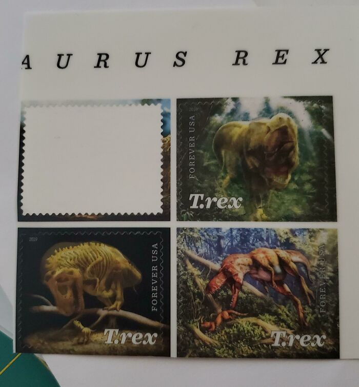 A sheet of T-Rex stamps with one missing, showing husband's funniest quirks in organization
