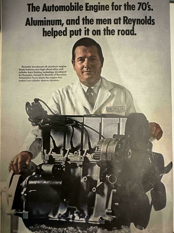A retro Reynolds advertisement featuring a man in a lab coat posing with a vintage aluminum automobile engine.