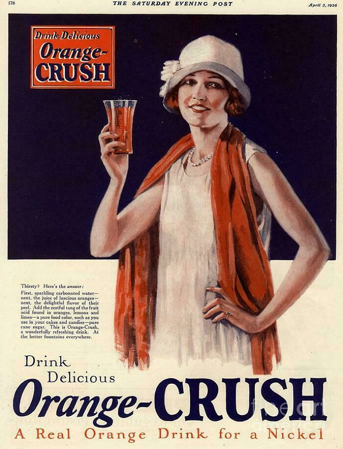 An Orange-Crush drink advertisement from 1926 featuring a woman in a white hat. Vintage products.