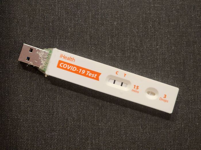 A humorous DIY project where an iHealth COVID-19 rapid test is converted into a USB drive.