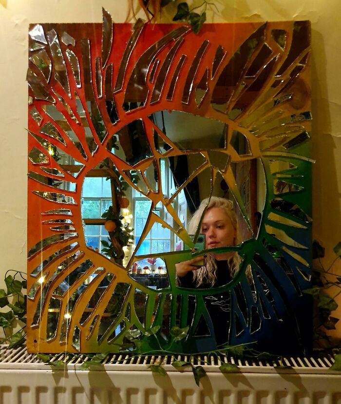 Creative DIY projects showing a colorful mosaic mirror made from shattered glass pieces