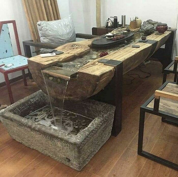 Rustic wooden river table with a built-in running water fountain DIY projects