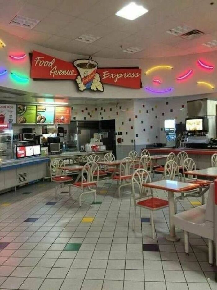 A nostalgic image of an old school Food Avenue Express restaurant with neon lights.