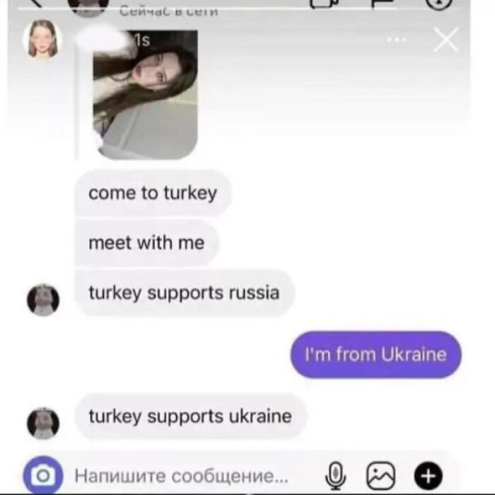 A cringe direct message exchange showing a sudden political shift to please a girl from Ukraine