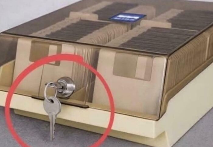 Vintage floppy disk storage box with key, nostalgic images evoking 90s kids memories