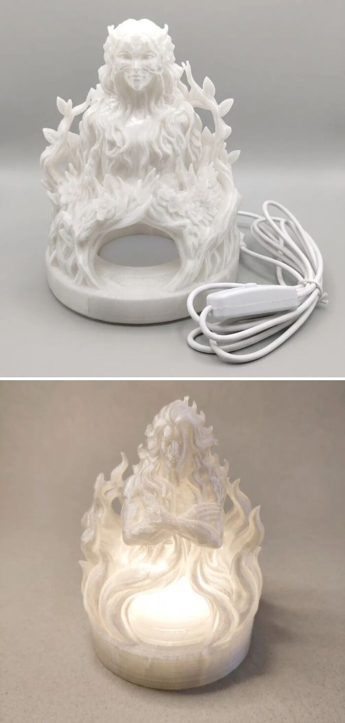 Intricate white 3D prints of female figures on lamp bases