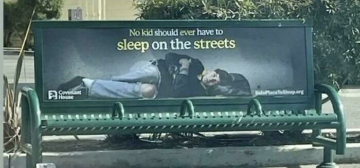 Public bench design preventing the homeless from lying down, reflecting issues of modern life in America.