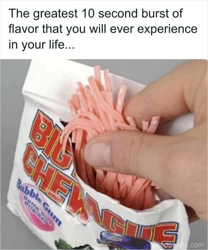 A hand grabbing shredded pink bubble gum from a pouch, evoking nostalgic images of 90s kids treats