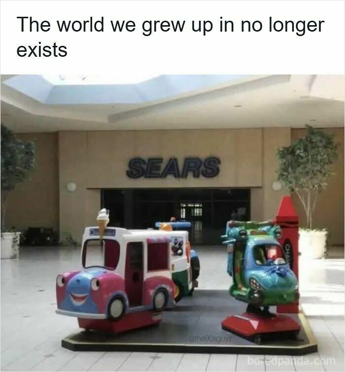 Sears storefront in a mall with kiddie rides, evoking nostalgic memories for 90s kids.