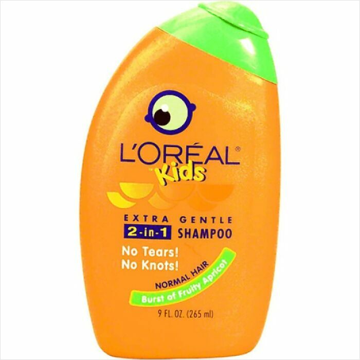 An orange bottle of L'Oreal Kids 2-in-1 shampoo, iconic to 90s kids childhood